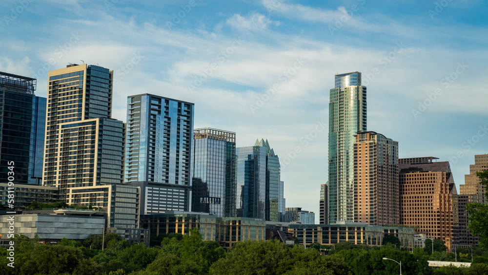 Austin, Texas; USA - May 28 2020: Downtown Austin, Texas Skyline with riverfront residential and commercial buidlings