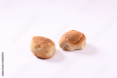 Two loaves of bread on the white background.