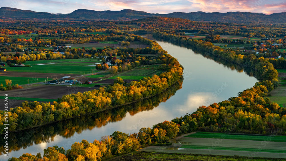 Pioneer Valley with the Connecticut River in Deerfield, Massachusetts at sunset- Northeast agriculture