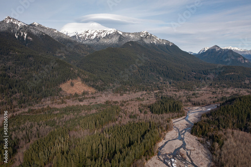 Aerial panormaic view of Nisqually River and valley landscape in Washington wilderness near Mount Rainier National Park - 4K Drone