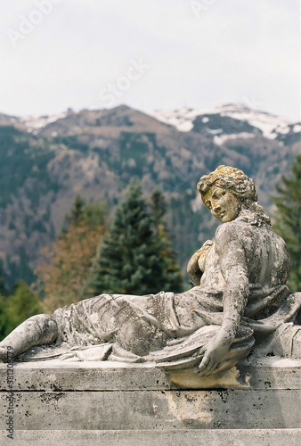 statue and the mountains  photo