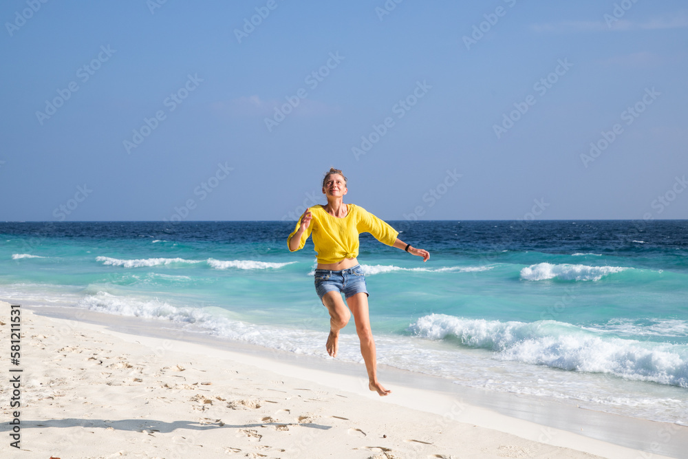 beautiful woman having fun on a tropical beach beautiful woman having fun on a tropical beach