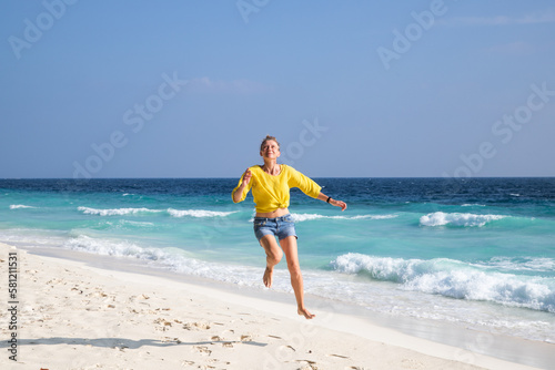 beautiful woman having fun on a tropical beach
