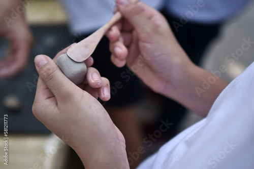 child working with clay