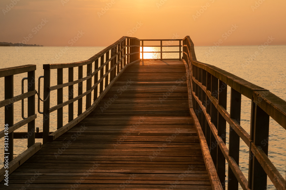 Scenic jetty with golden morning liaght, seascapes