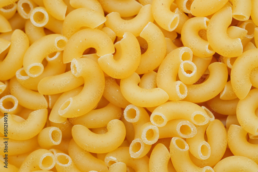 Background of Uncooked Noodles. Texture of Dry Vermicelli. Raw Pasta. Bunch of raw pasta Background of Uncooked Noodles. Texture of Dry Vermicelli. Raw Pasta. Bunch of raw pasta