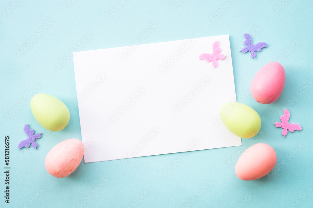 Easter background on blue. Greeting card. Flat lay with copy space. Easter background on blue. Greeting card. Flat lay with copy space.