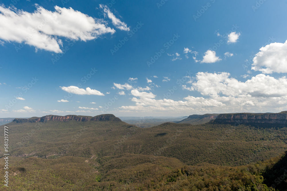 Blue Mountains in Sydney, Australia. Cloudy Blue Sky and Shadows, Wide Angle.