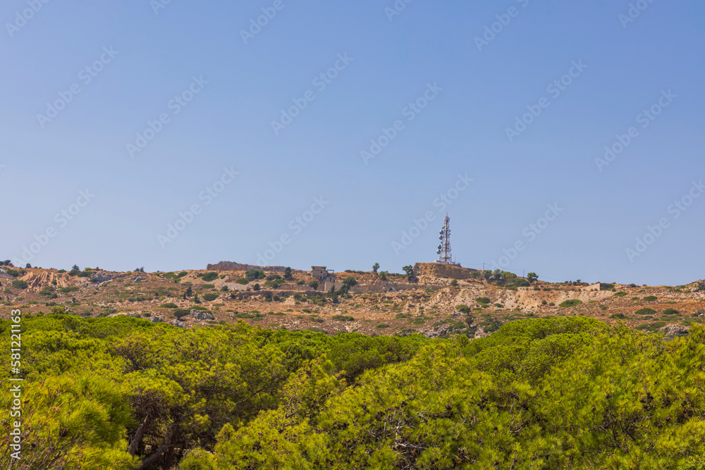 Beautiful view of mountain landscape of island of Rhodes with TV tower on top of mountain. Greece.