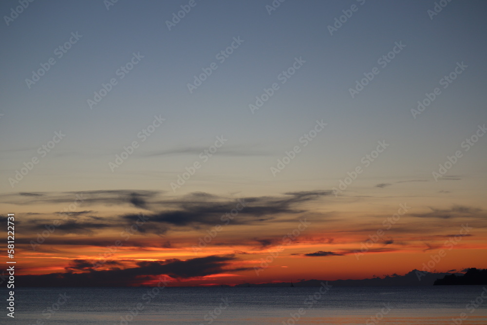 sunset over the sea sunset over the sea