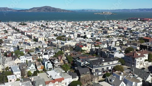 
Seaside San Francisco residential neighborhood with Alcatraz Prison and Island in distance - 4K Drone