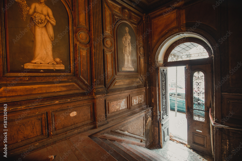 Entrance hall in old abandoned mansion