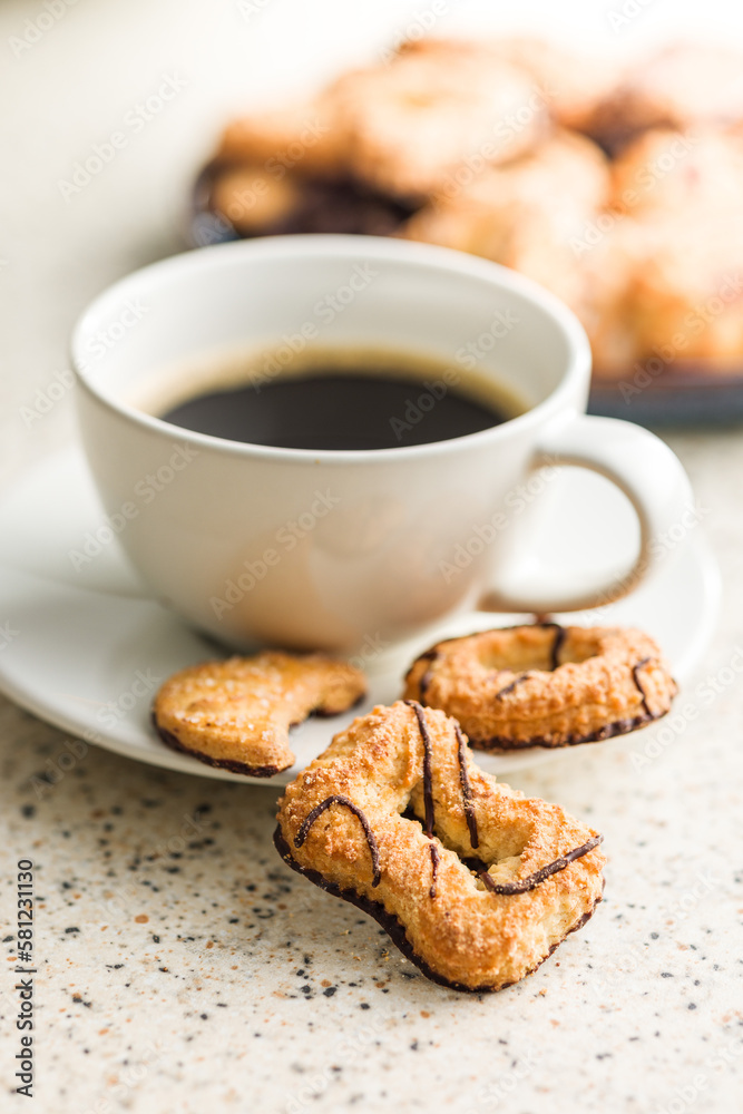 Assorted various cookies. Sweet biscuits and coffee cup. Assorted various cookies. Sweet biscuits and coffee cup.