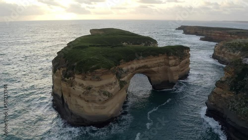 Aerial: 12 Apostles Great Ocean Road Australia Port Campbell National Park Cliffs in on the Coast of Pacific Ocean Evening Sun Popular touristic place