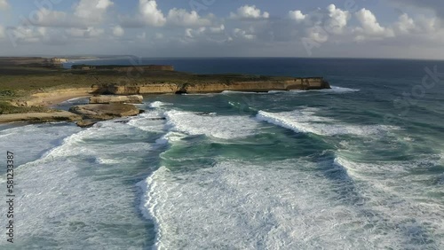 Aerial: 12 Apostles Great Ocean Road Australia Port Campbell National Park Cliffs in on the Coast of Pacific Ocean Evening Sun Popular touristic place