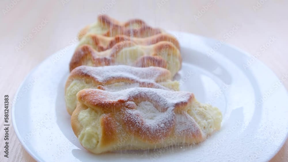 freshly baked lemon gugelhupf with icing sugar. High quality 4k footage freshly baked lemon gugelhupf with icing sugar. High quality 4k footage