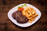 Pljeskavica, Balkan burger of mixed meats with french fries