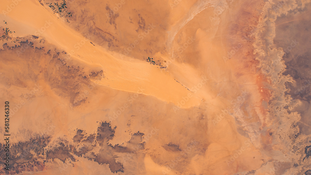 Sahara Desert in Algeria aerial view. Earth landscape. Selective focus included. Elements of this image furnished by NASA.