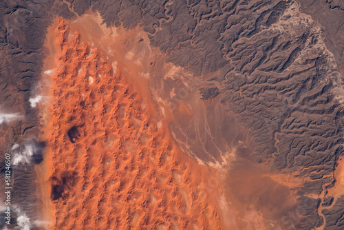 Fototapeta Naklejka Na Ścianę i Meble -  Sahara Desert in Algeria aerial view. Earth landscape. Selective focus included. Elements of this image furnished by NASA.