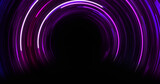 Image of purple and blue neon circle light trails on black background