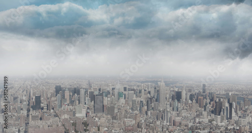 Cityscape with modern buildings and sky with clouds