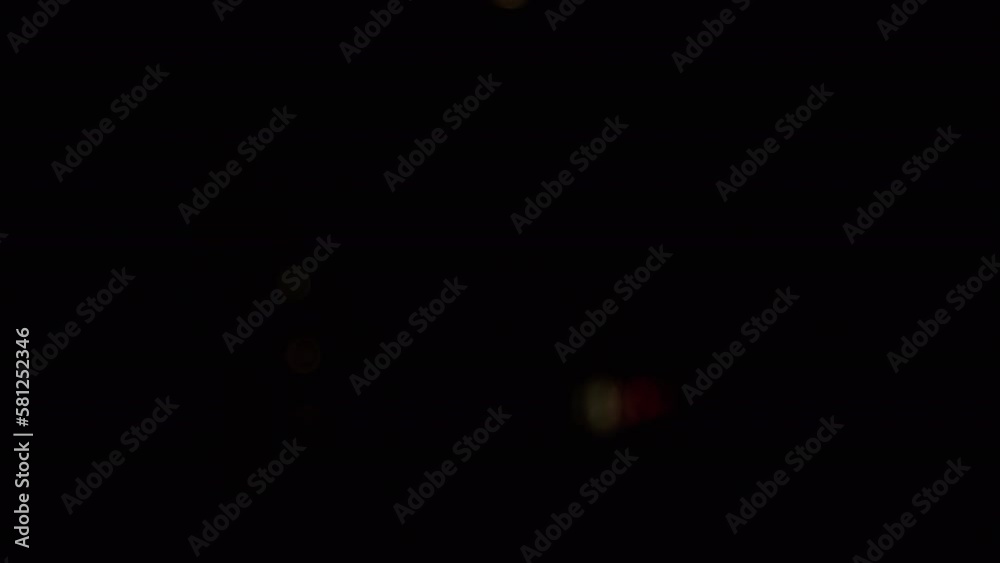 Flickering Christmas Light Bulbs, Toys on a blurred Christmas Tree Background. Unfocused abstract background with blinking golden light bulbs, and garland. Blurred bokeh. Christmas decoration. Xmas. Flickering Christmas Light Bulbs, Toys on a blurred Christmas Tree Background. Unfocused abstract background with blinking golden light bulbs, and garland. Blurred bokeh. Christmas decoration. Xmas.