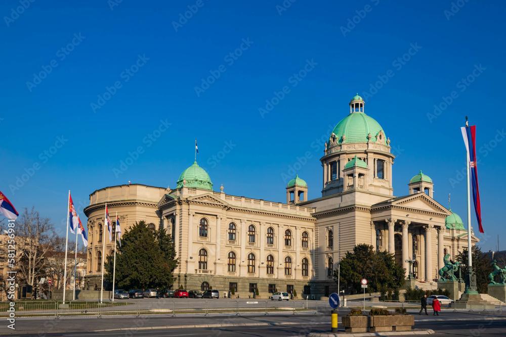 Parliament of Serbia in Belgrade, building of the National Assembly of the Republic of Serbia with national flags