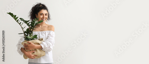 Beautiful young woman with ...