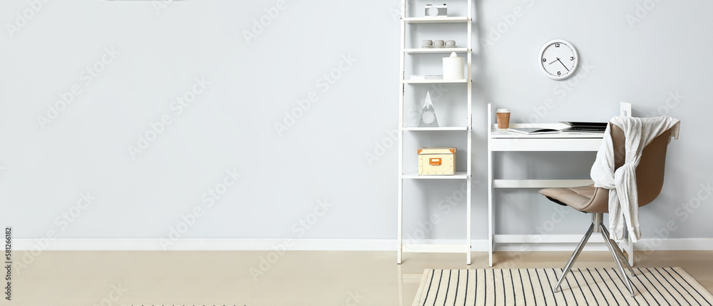 Interior of stylish room with modern workplace and shelving unit. Banner for design - obrazy, fototapety, plakaty 