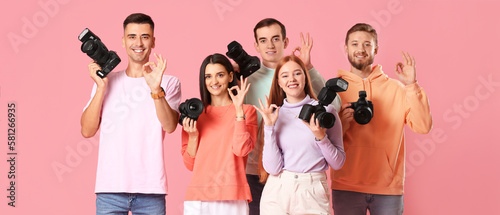 Group of happy young photog...