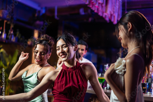 Stampa su tela Asian beautiful women having fun, meeting each other in bar restaurant
