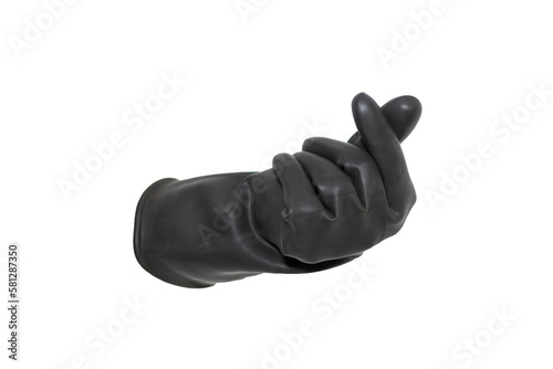 Black rubber glove isolated on a white background doing the Korean heart gesture with the thumb and index fingers. photo