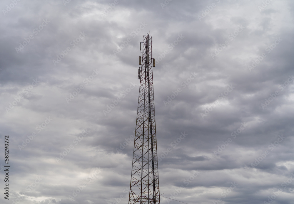 TV radio antenna network telecom tower isolated on sky. Station TV radio antenna network telecom tower isolated on sky. Station
