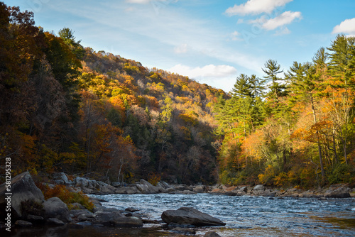 Fall foliage along the Youghiogheny River in Ohiopyle, Pennsylvania photo