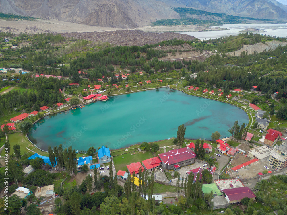 Aerial top view of heart love shape pond river lake in Karakoram high mountain hills. Nature landscape background, Skardu,Gilgit, Pakistan. Travel on holiday vacation. - obrazy, fototapety, plakaty 