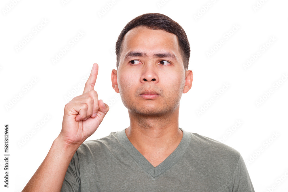 Man wearing casual t-shirt standing pointing finger up pensive expression. Doubt concept. Isolated white background Man wearing casual t-shirt standing pointing finger up pensive expression. Doubt concept. Isolated white background