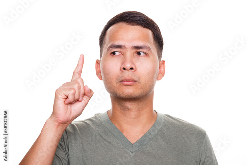 Man wearing casual t-shirt standing pointing finger up pensive expression. Doubt concept. Isolated white background
