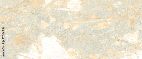 emprador marble finish in brown color natural texture in yellow color vines design photo