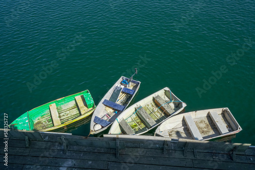 A row of boats docked in Monterey Bay, CA © Frank