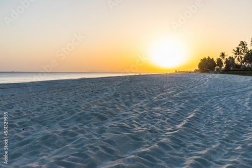 evening white sand beach in Salalah, Sultanate of Oman © dadamira
