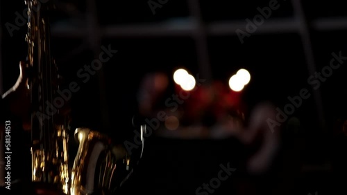 Saxophone playing in a restaurant during a romantic dinner for couples