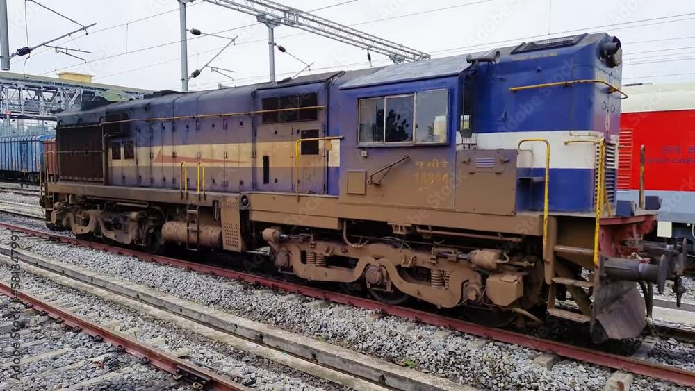 train engine of indian railway parked at tracks at day from different angle train engine of indian railway parked at tracks at day from different angle