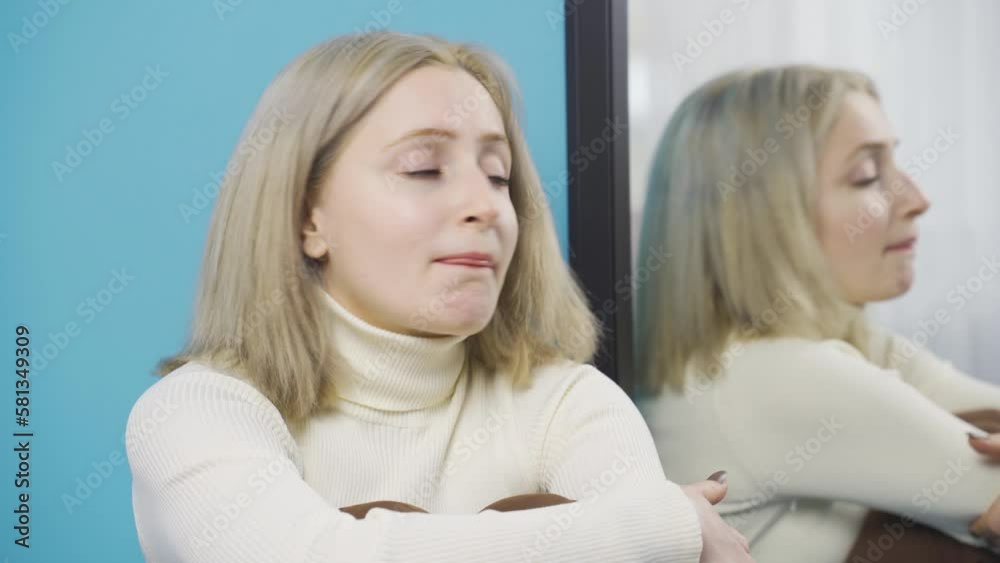 Youth problems, woman with insecure life concerns.
Girl in 20s immersed in sad thoughts, looking in a mirror, feeling stressed and unhappy.
Youth problems, woman with insecure life concerns.
Girl in 20s immersed in sad thoughts, looking in a mirror, feeling stressed and unhappy.