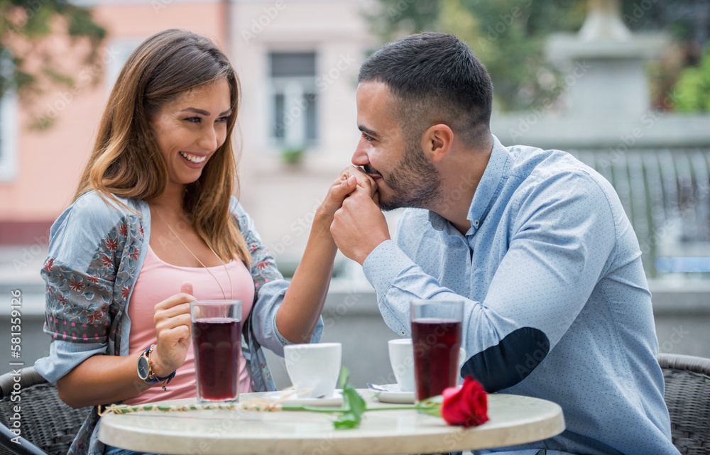 Romantic couple in the cafe. Dating, love, relationships Romantic couple in the cafe. Dating, love, relationships