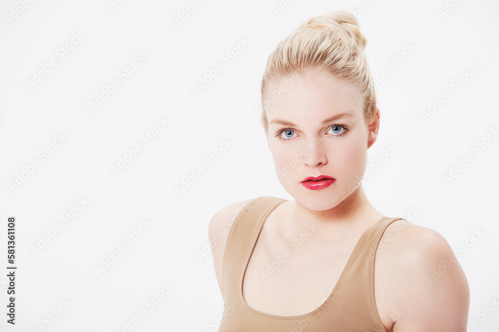 Confidence comes with looking great. Portrait of a stern model with red lipstick on. Confidence comes with looking great. Portrait of a stern model with red lipstick on.