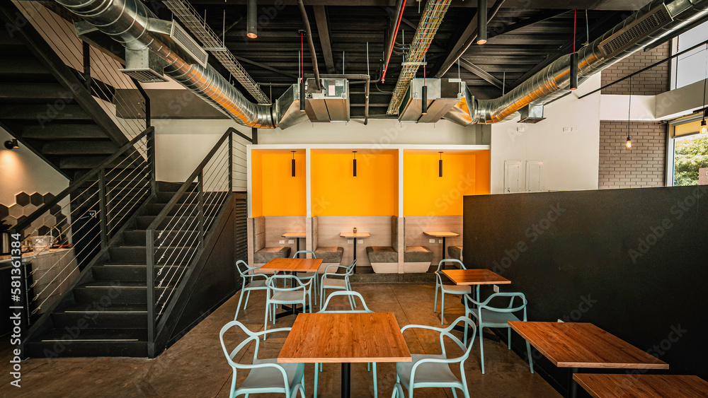 Modern co working office building complex with integrated coffee shop with contemporary interior