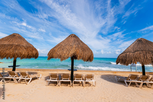 Tropical paradise beach with white sand and coco palms travel tourism wide panorama background. Luxury vacation and holiday  tropical beach resort concept. Beautiful beach design in cancun  mexico