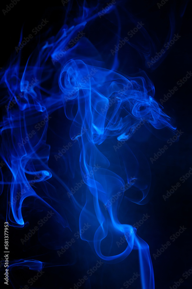 Blue smoke motion on black background.