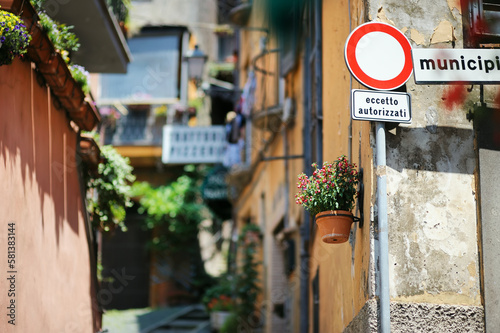 Italian road sign meaning that the exception is for those that are authorized