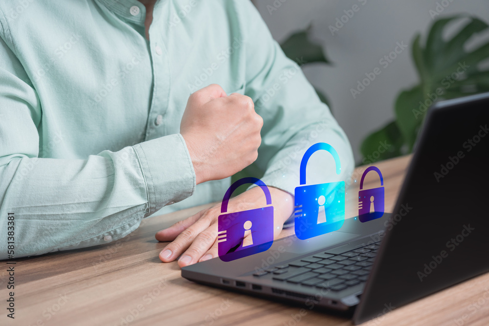 Concept of security identity theft and internet cyber crime. Hacker attack with damage the system and hack the data, Hacking and stealing data. Man using a laptop computer in the cafe. Concept of security identity theft and internet cyber crime. Hacker attack with damage the system and hack the data, Hacking and stealing data. Man using a laptop computer in the cafe.